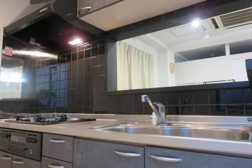 アンドステイ石原2丁目201 Apartamento Tóquio Exterior foto